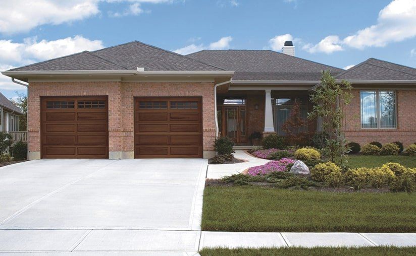 classic-wood-design-long-stockton-window-cedar-garage-door-1920w.jpeg