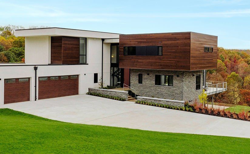 modern-steel-flush-long-window-walnut-garage-door-1920w.jpeg