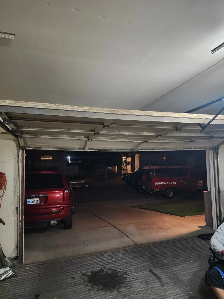 the routine safety testing, tracking adjustments, and hardware inspections involved in proactive residential garage door maintenance