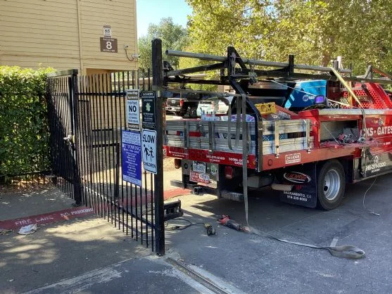 the mechanical adjustments, track alignment, and operator system troubleshooting involved in professional automatic gate repair