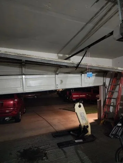 urgent service calibration required due to a broken garage door spring
