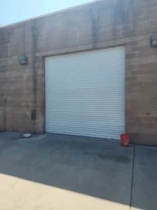 secure wall anchoring required for a professional rolling door installation